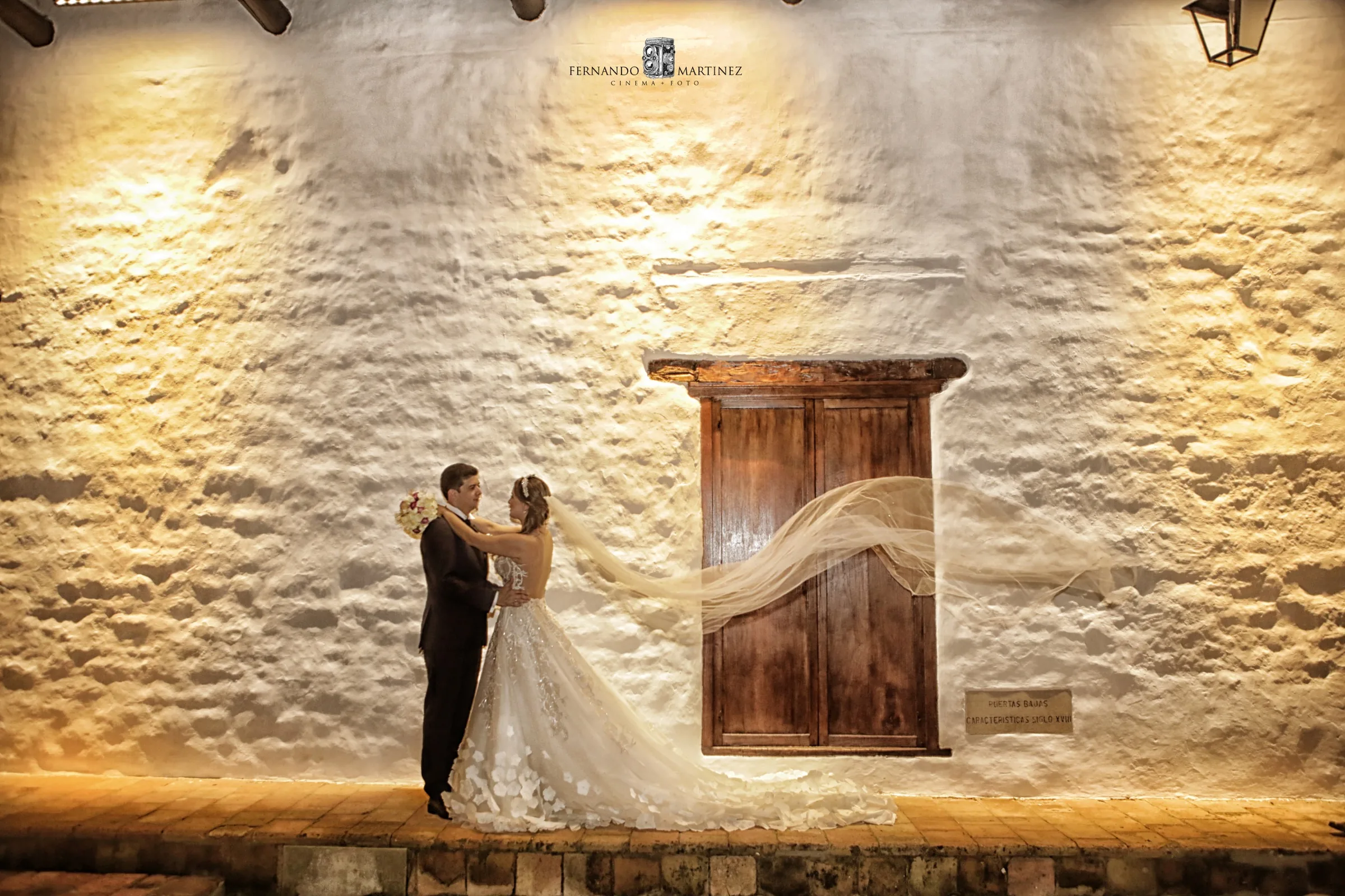 Couple at colonial hacienda at sunset